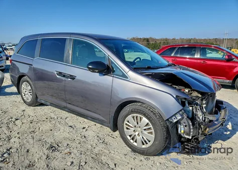 2014 Honda Odyssey Lx z USA, uszkodzony, nr VIN 5FNRL5H22EB138228